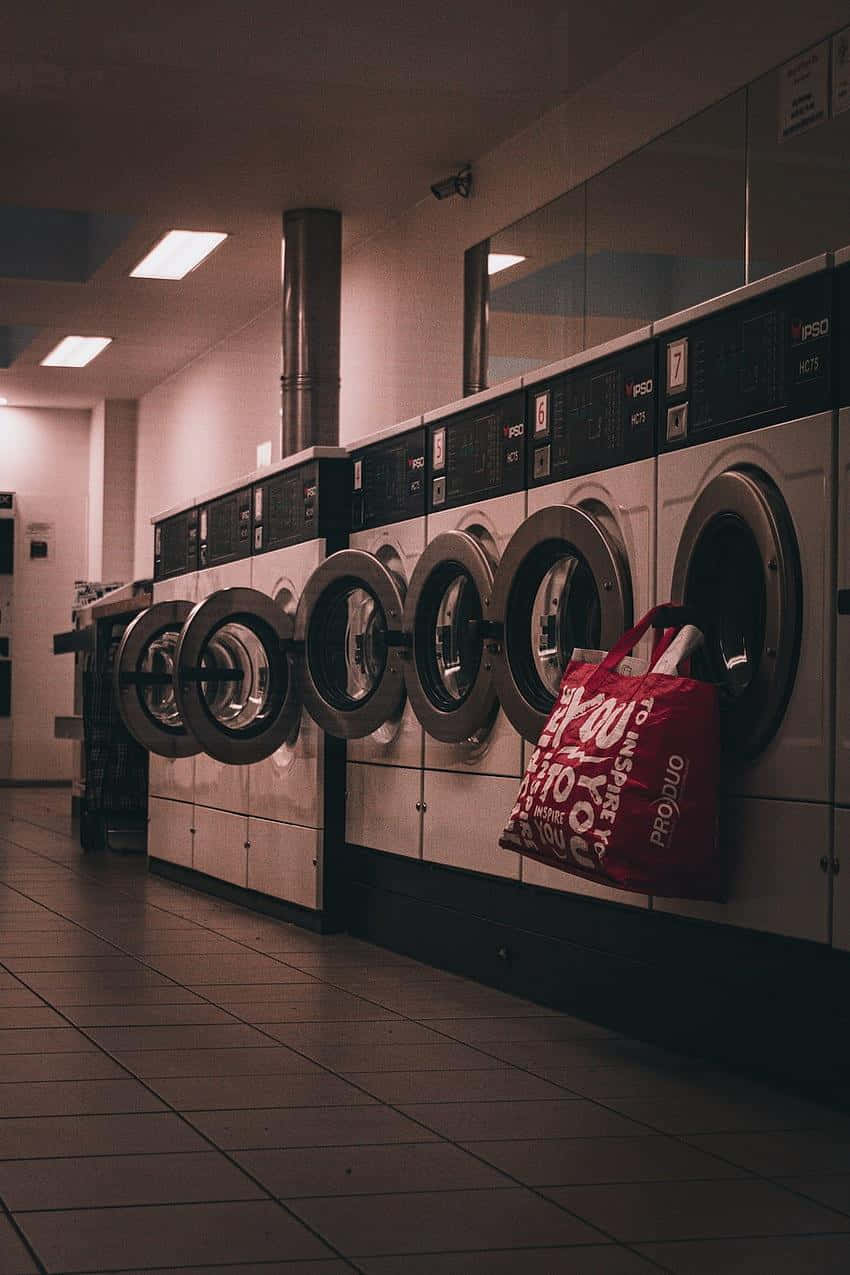 Laundromat Rowof Washing Machines.jpg Wallpaper