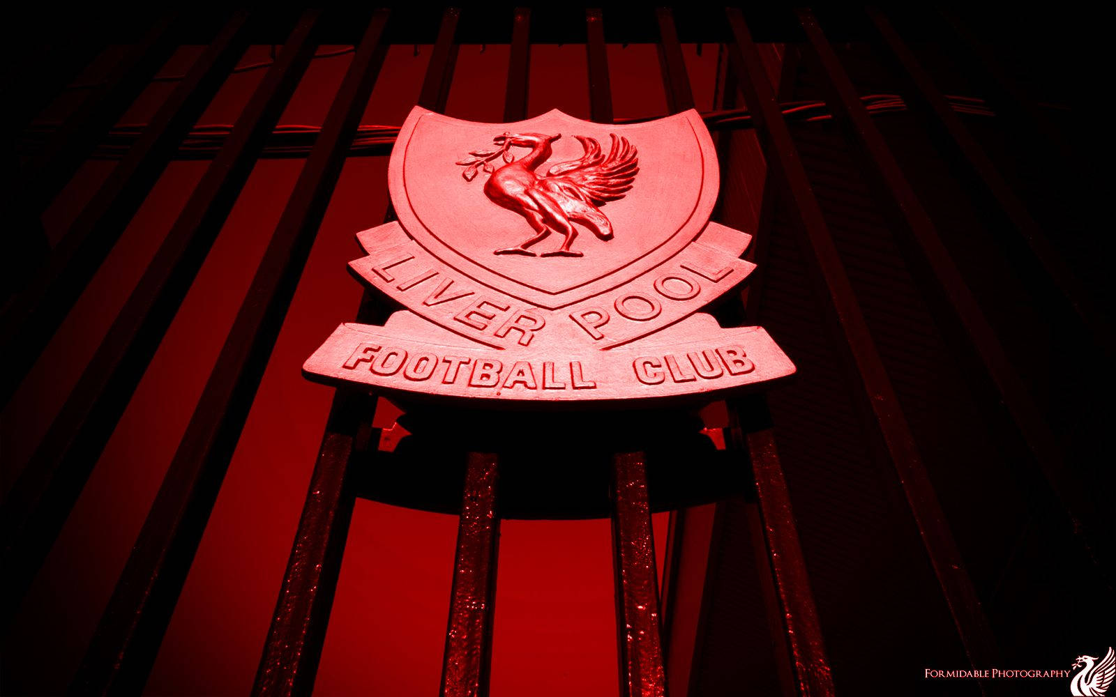 Liverpool Fc Logo At Anfield's Shankly Gates Wallpaper