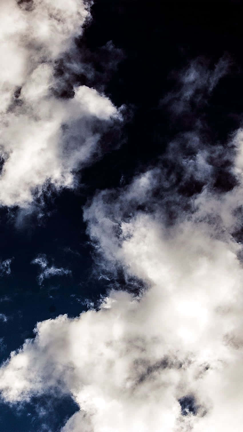 Looking Up At Dark And Brooding Clouds Wallpaper