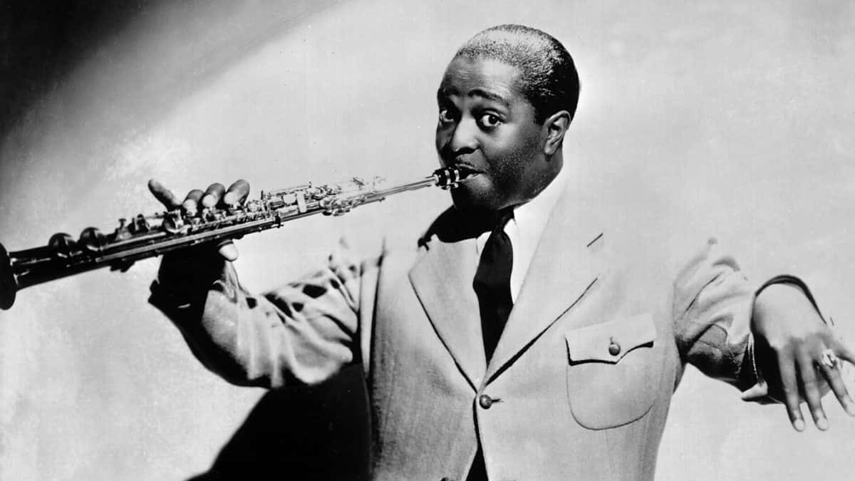 Louis Jordan Playing Saxophone Wallpaper