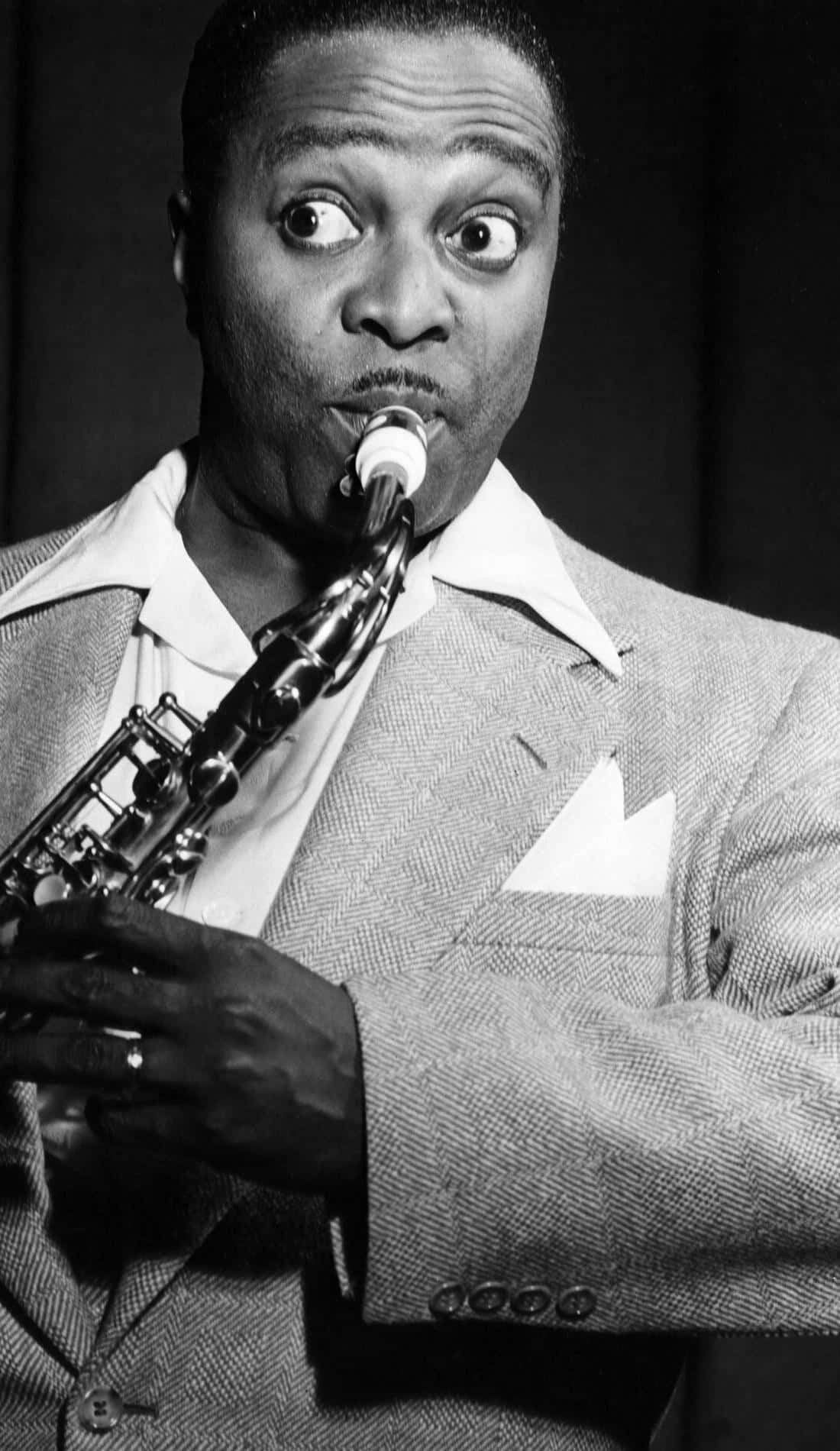 Louis Jordan Saxophone Performance Wallpaper