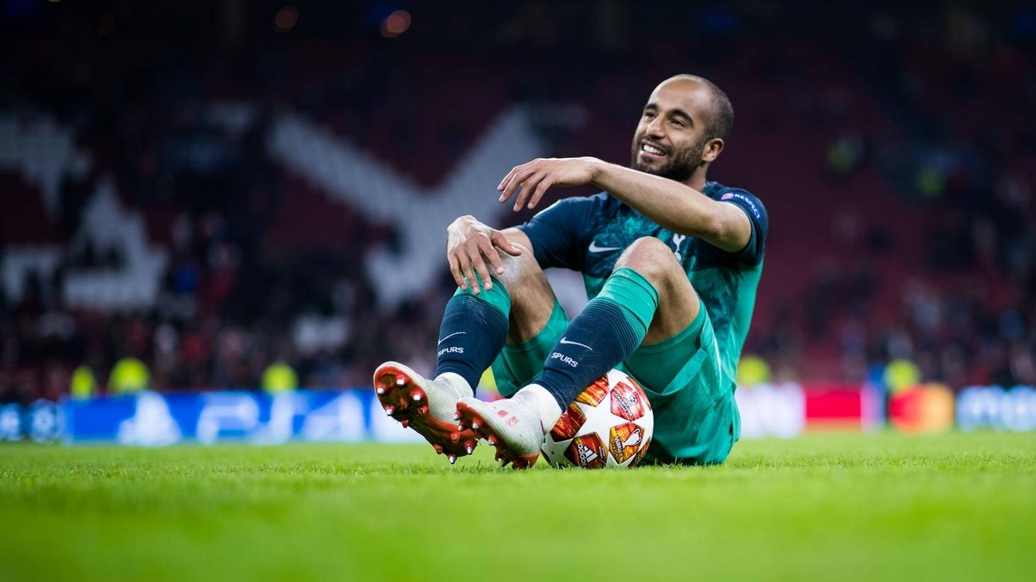 Lucas Moura Sitting On Football Field Wallpaper