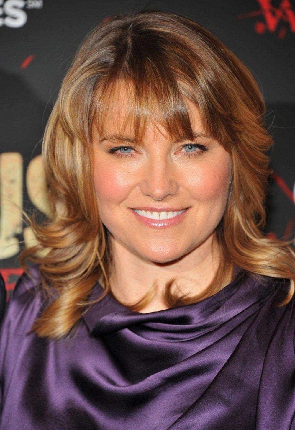 Lucy Lawless Purple Satin Top Wallpaper