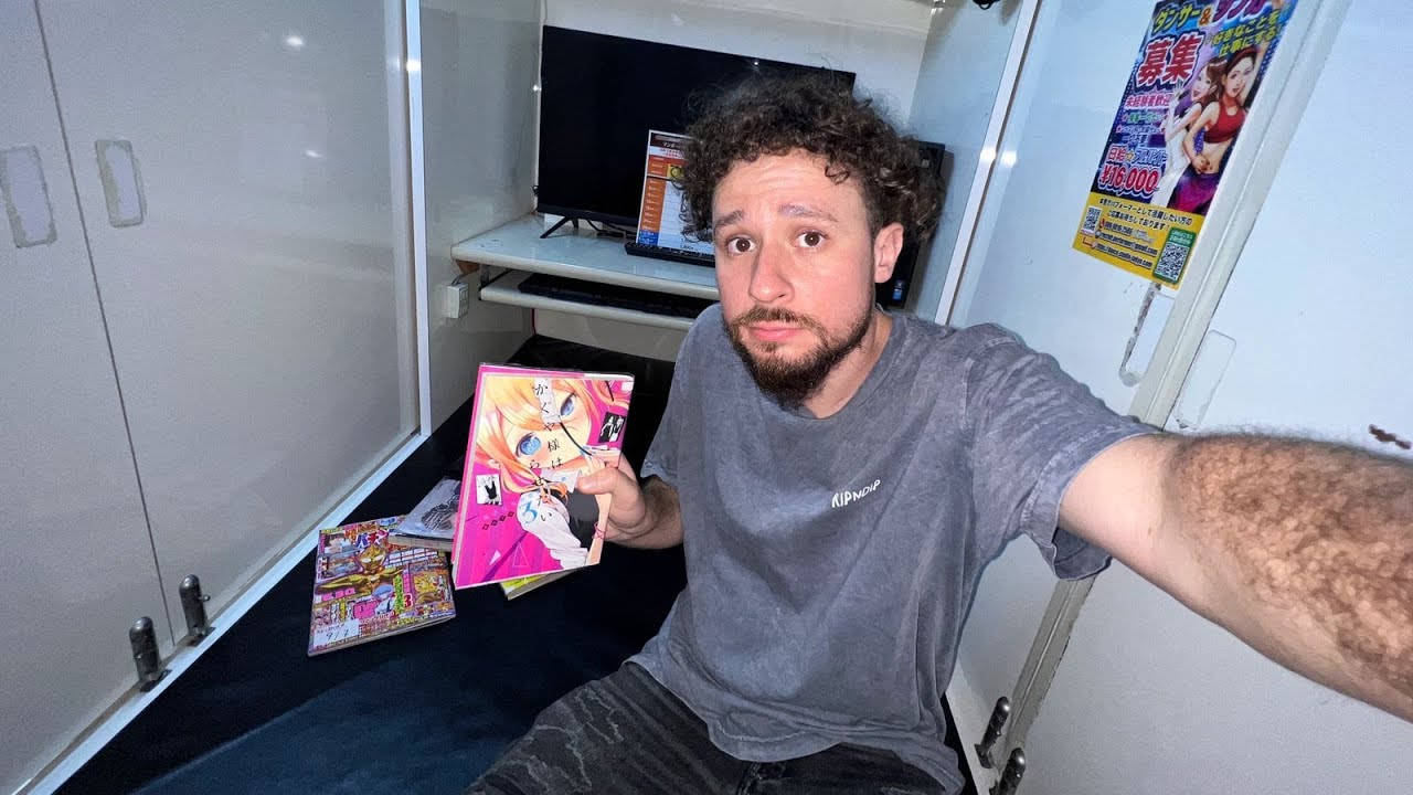 Luisito Comunica Holding A Manga Wallpaper