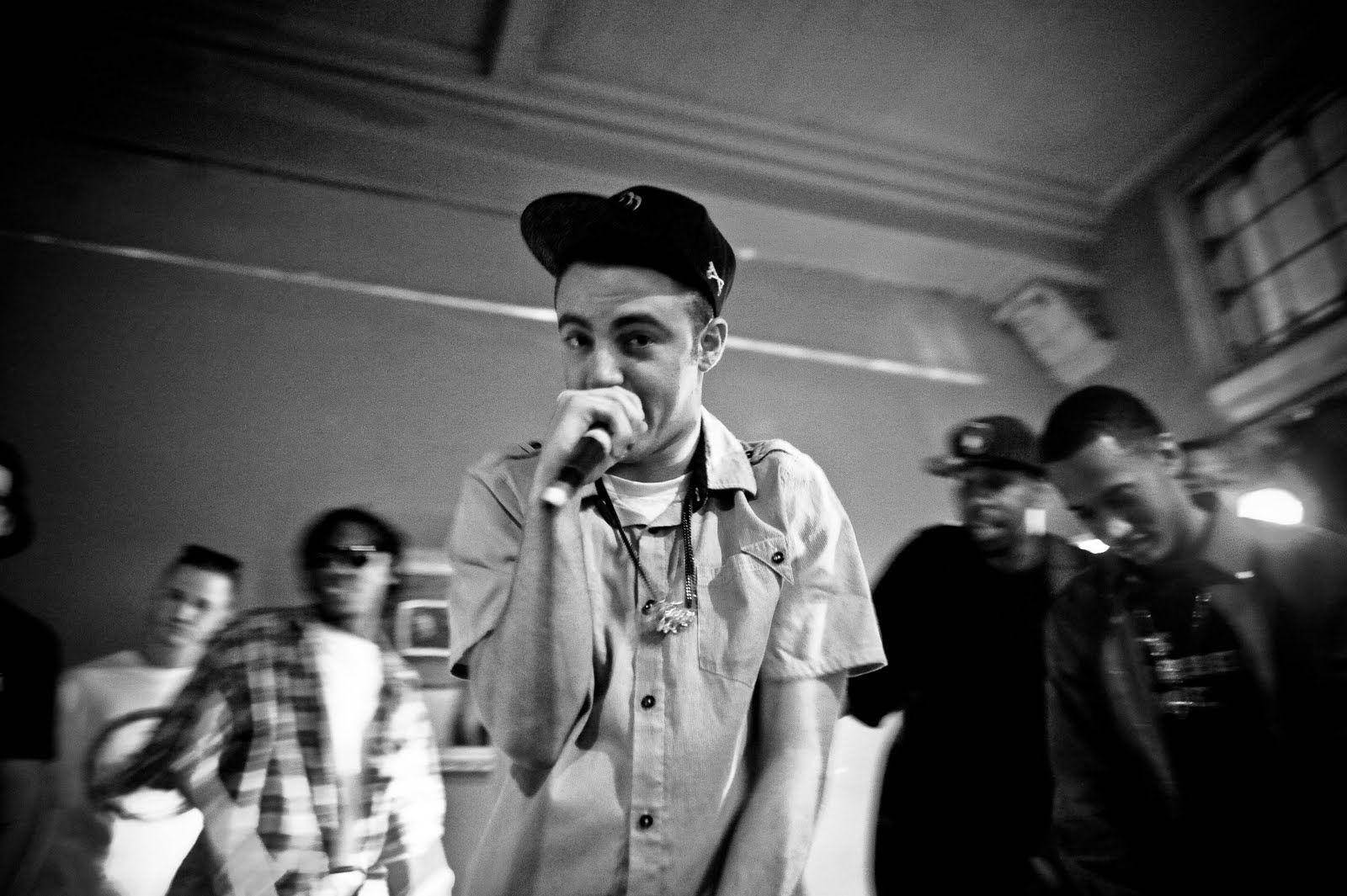 Mac Miller Holding Microphone Wallpaper