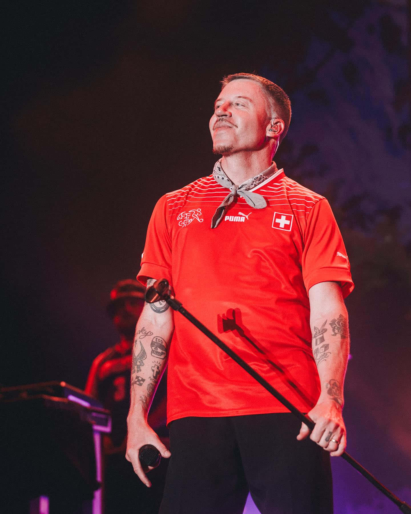 Macklemore Performing Livein Red Jersey Wallpaper