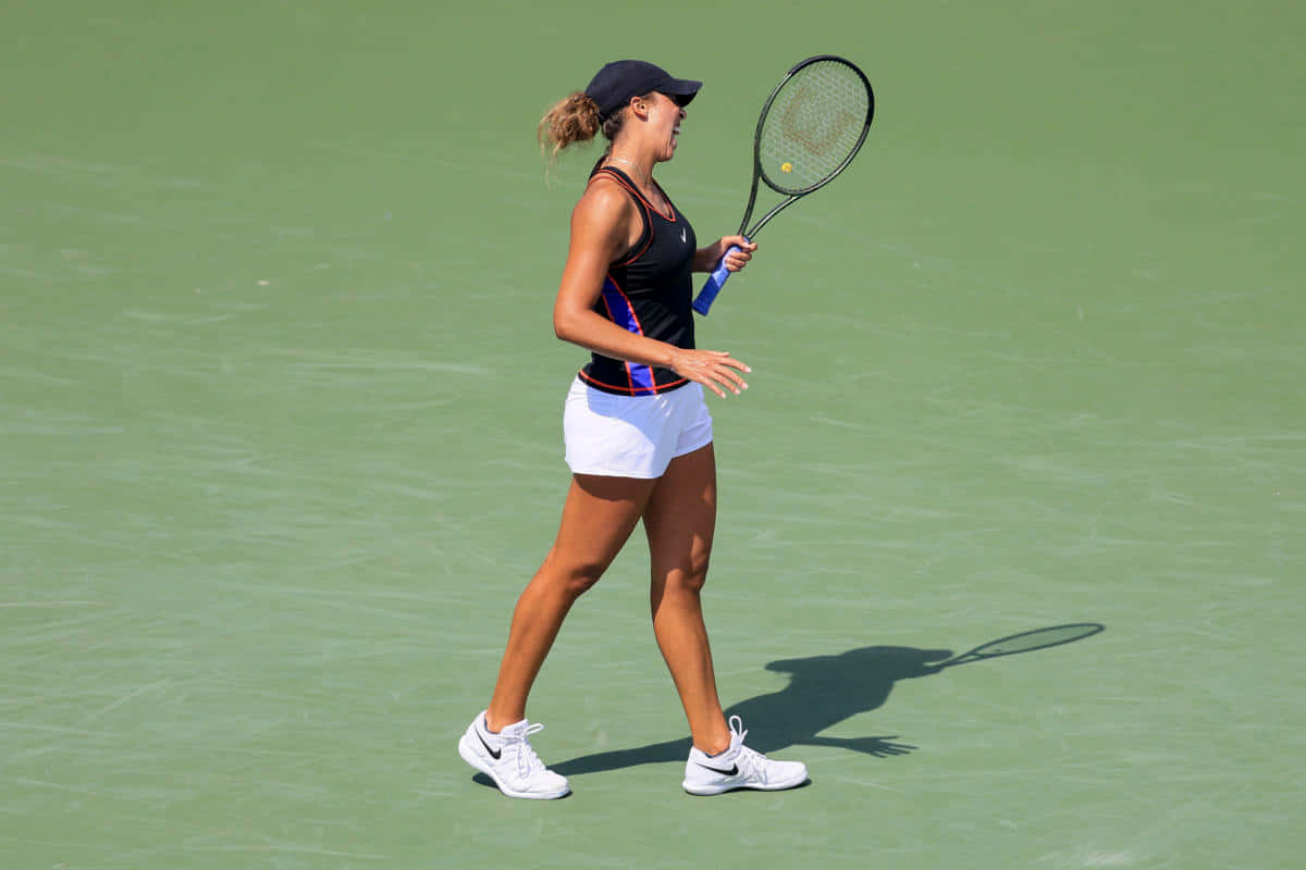 Madison Keys In Action On The Tennis Court. Wallpaper