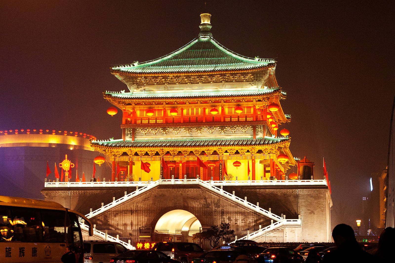 Majestic Bell Tower Illuminated At Night In Xian City Wallpaper