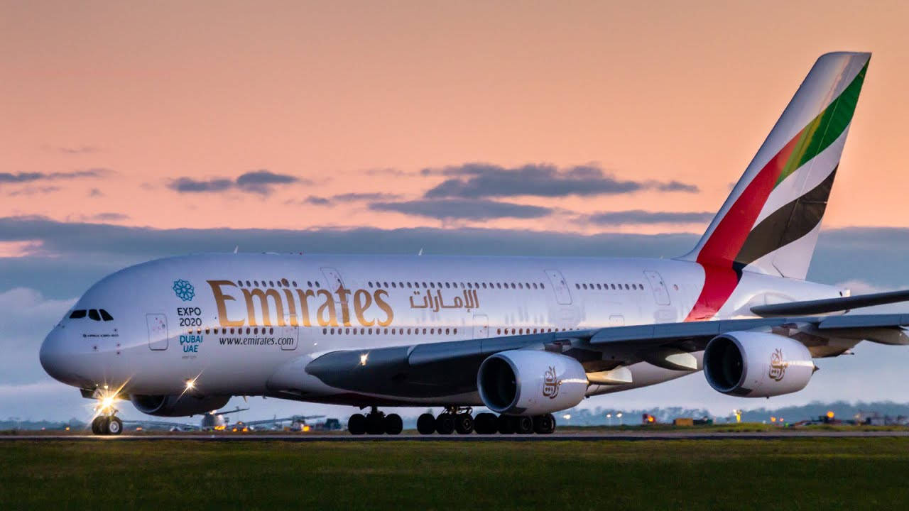 Majestic Emirates Airbus A380 Soaring In The Sky Wallpaper