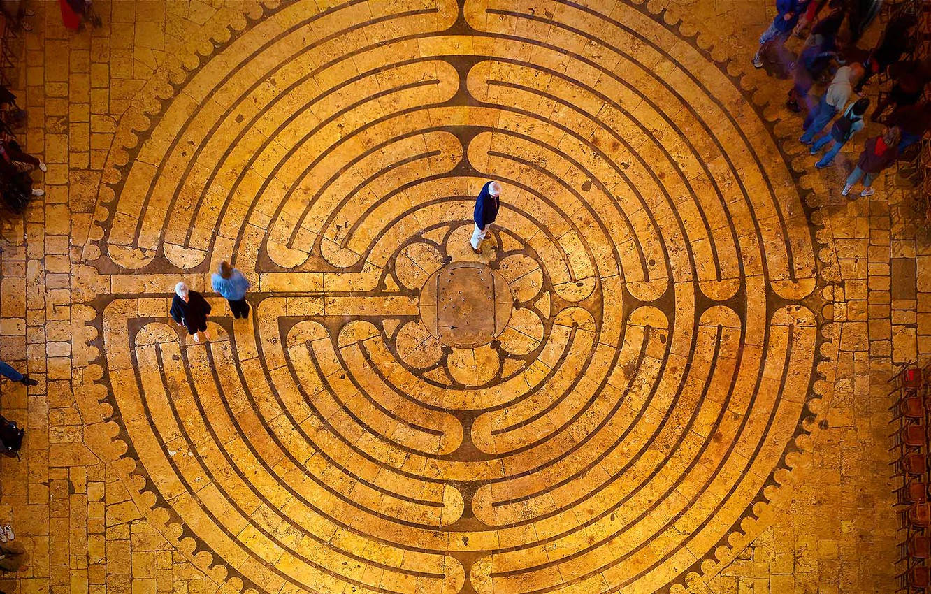 Majestic Interior And Intricate Floor Tiles Of Chartres Cathedral Wallpaper