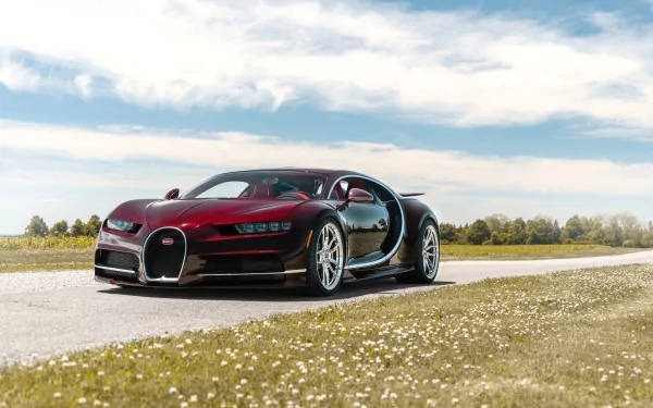 Majestic Maroon Bugatti Chiron Under The Spotlight In 4k Wallpaper