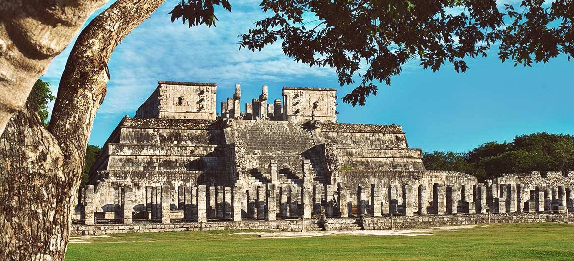 Majestic View Of Chichen Itza At Sunset Wallpaper