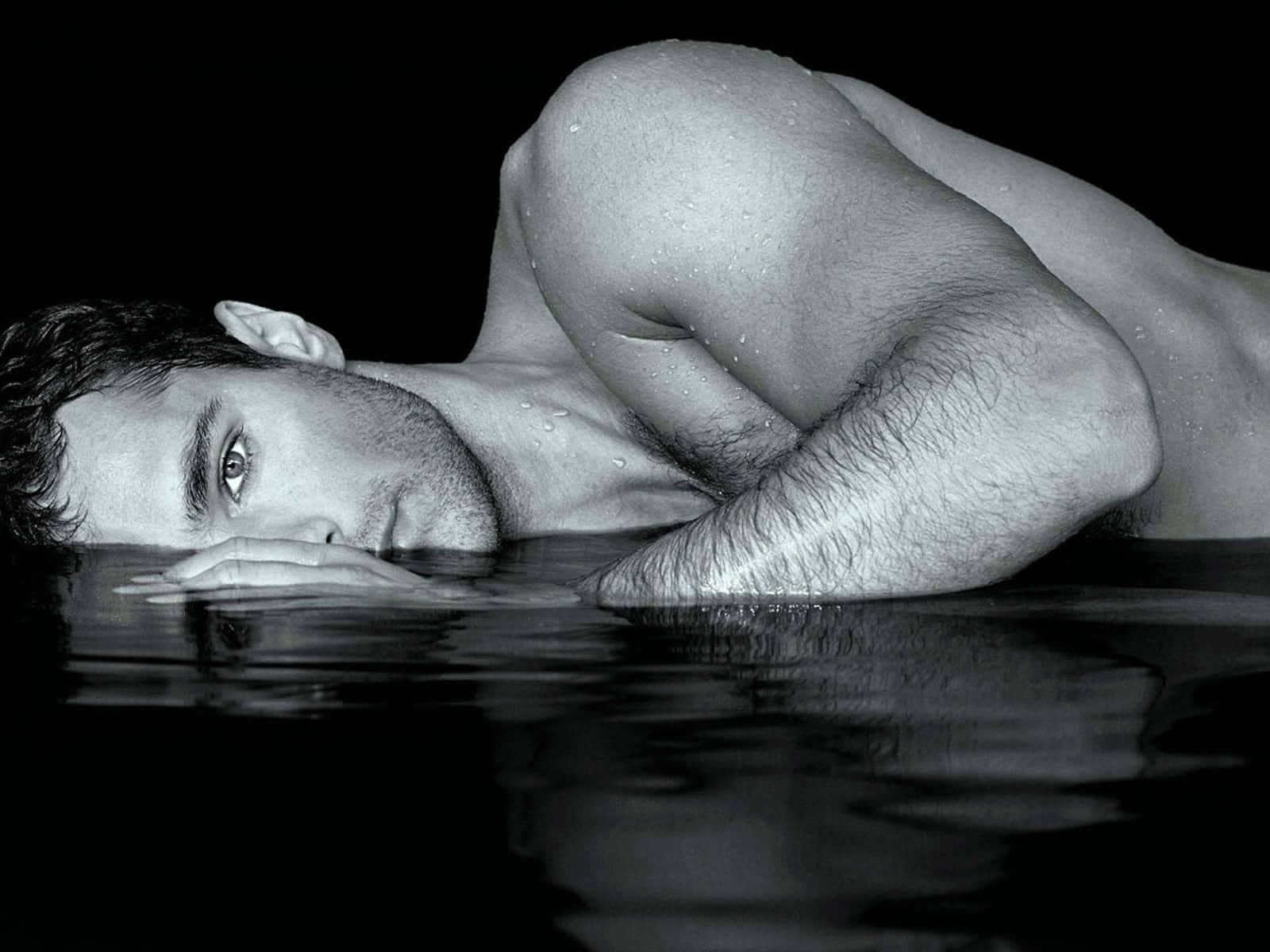 Male Model Dipping Water Wallpaper