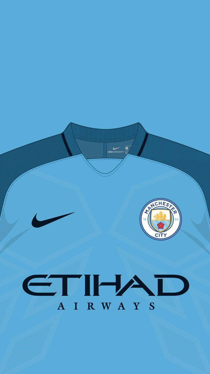 Manchester City Logo On Blue Jersey Wallpaper