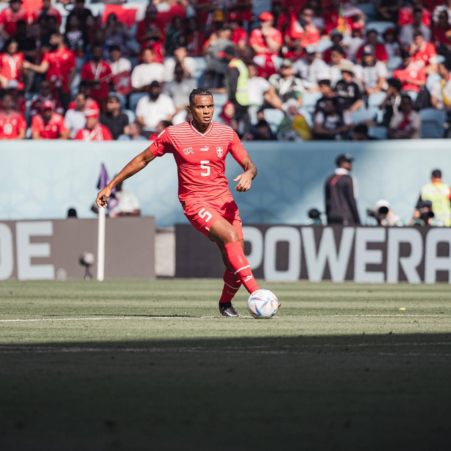 Manuel Akanji Running In All Red Wallpaper