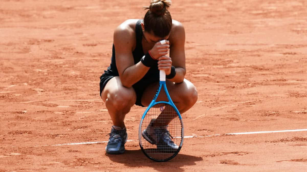 Maria Sakkari In Action During A Tennis Match. Wallpaper