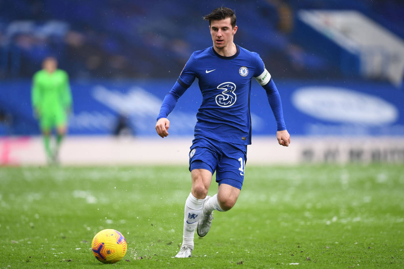 Mason Mount In Blue Kicks Yellow Football Wallpaper