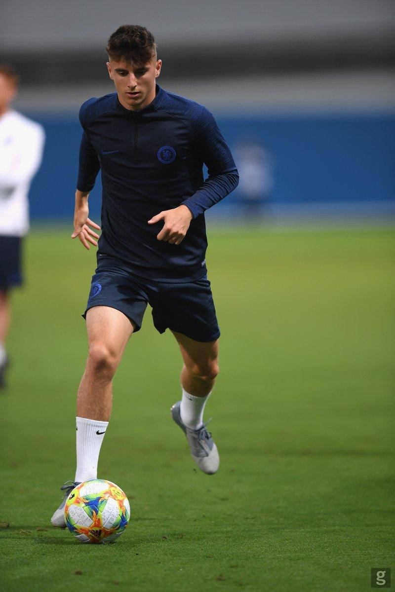 Mason Mount In Dark Blue Kicking The Ball Wallpaper