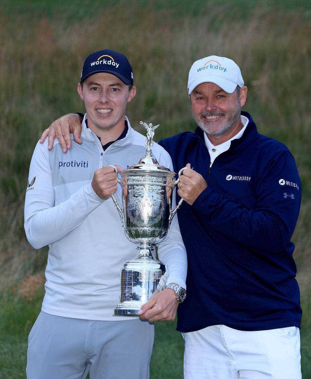 Matt Fitzpatrick And Billy Foster Holding Trophy Wallpaper