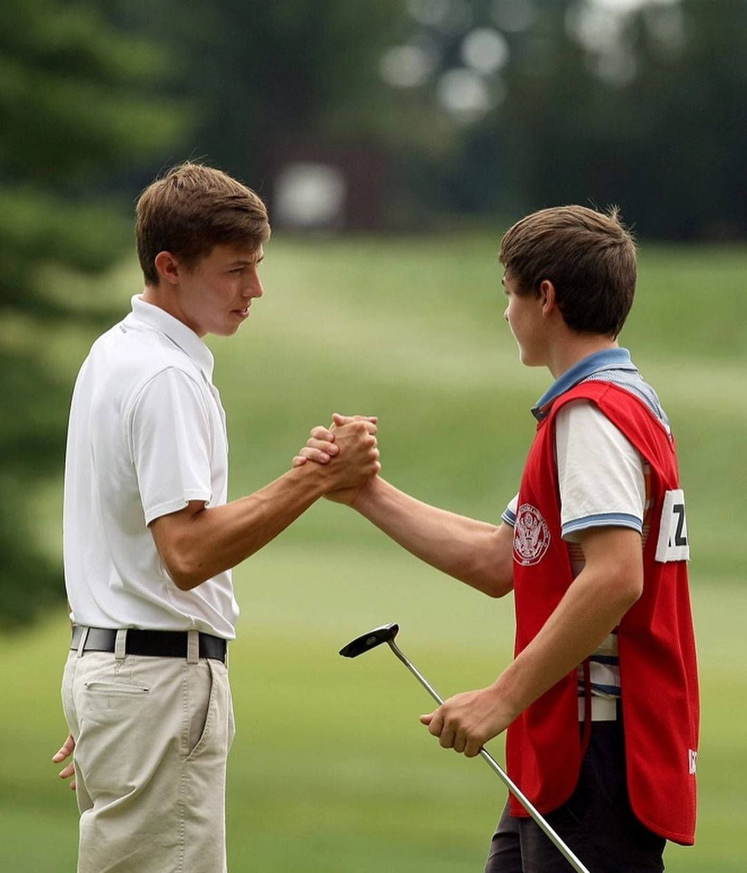 Matt Fitzpatrick Shaking Hands With Brother Wallpaper