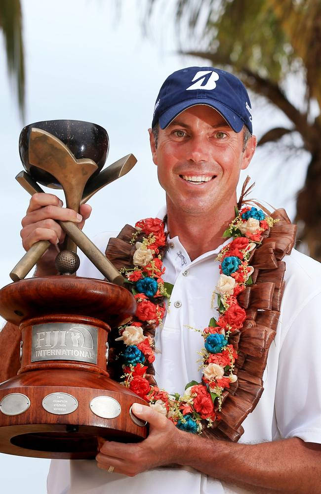 Matt Kuchar Holding A Trophy Wallpaper