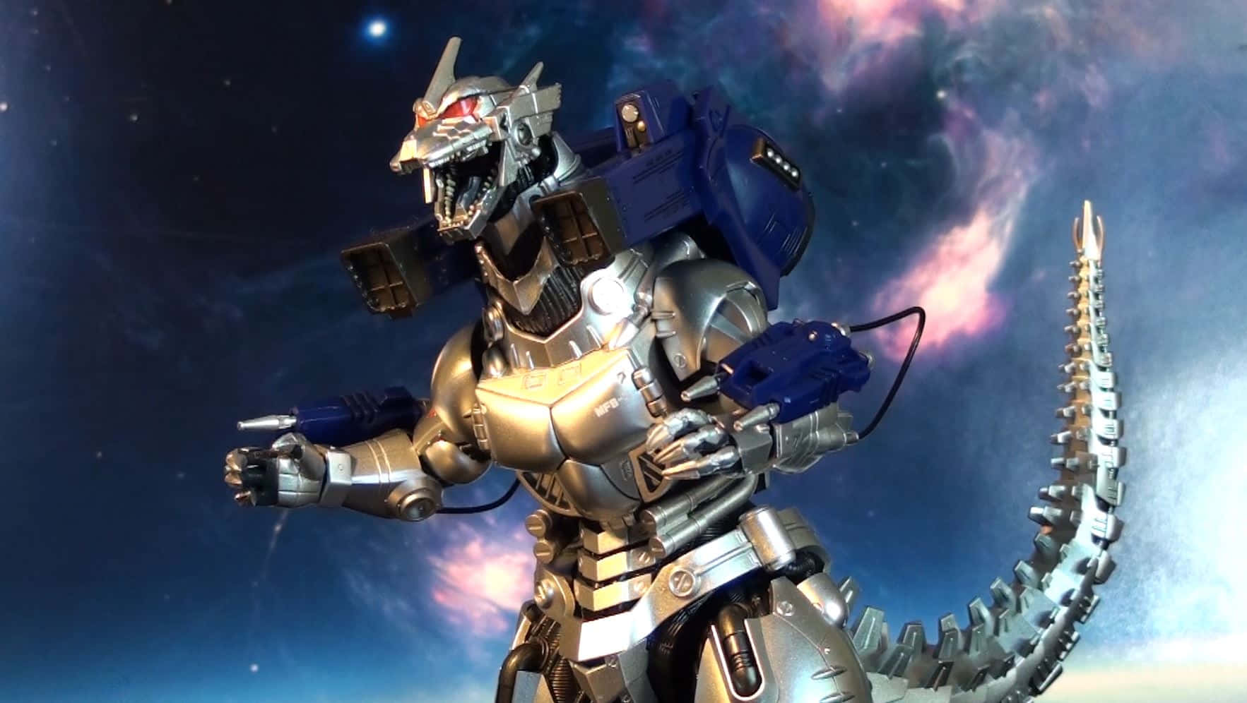 Mechagodzilla In All Its Metallic Glory On A Battlefield Wallpaper