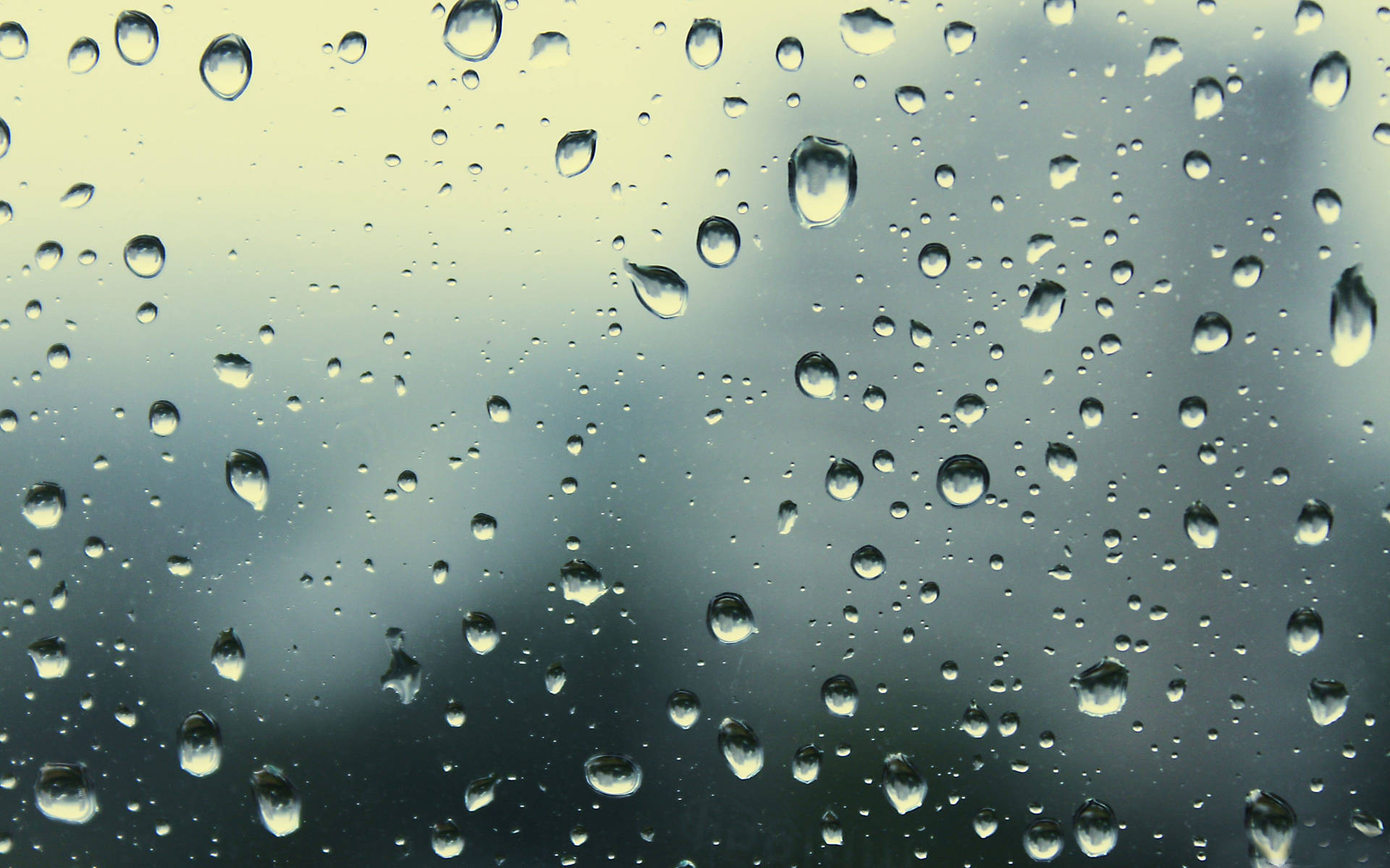 Misty Raindrops On A Glass Pane Wallpaper