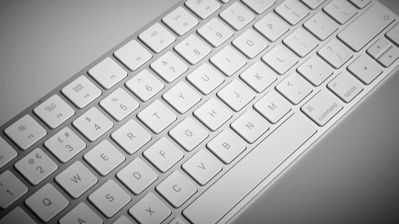 Modern Specifics Of A Technological Icon - Silver Mac Computer Keyboard Wallpaper