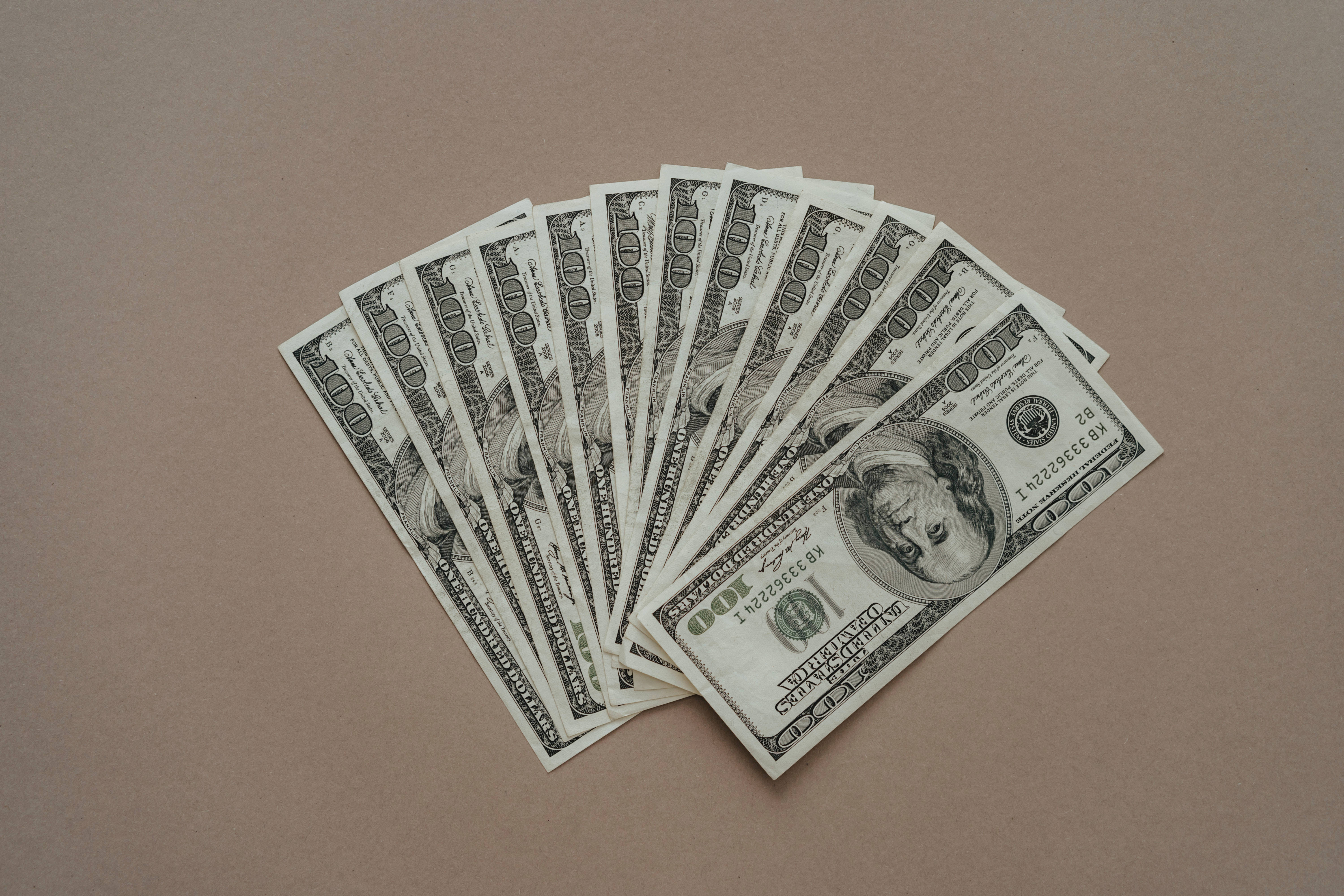 Money Background One Hundred Bills On Brown Background Wallpaper