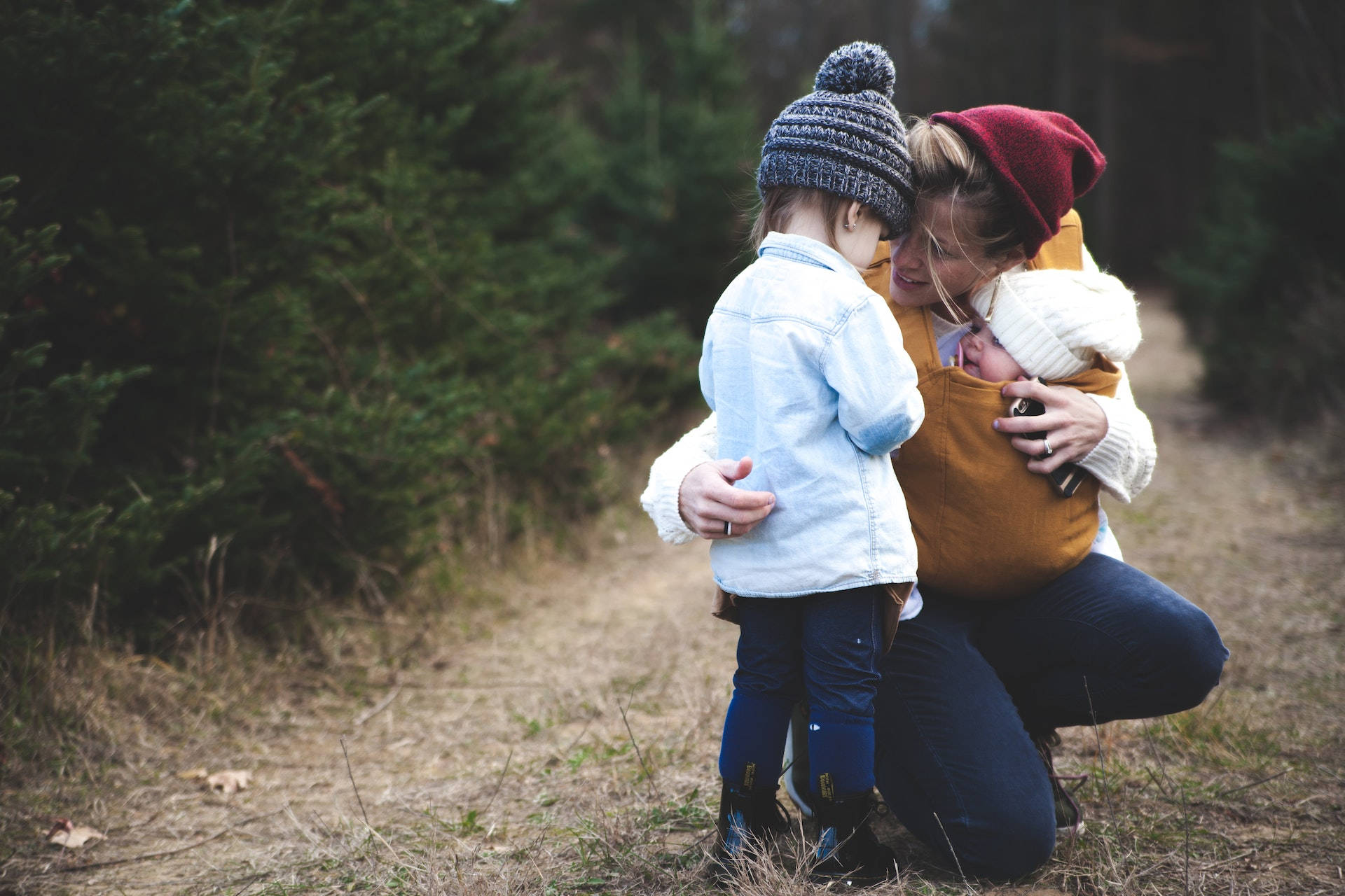 Mother, Toddler, And Baby Love Wallpaper