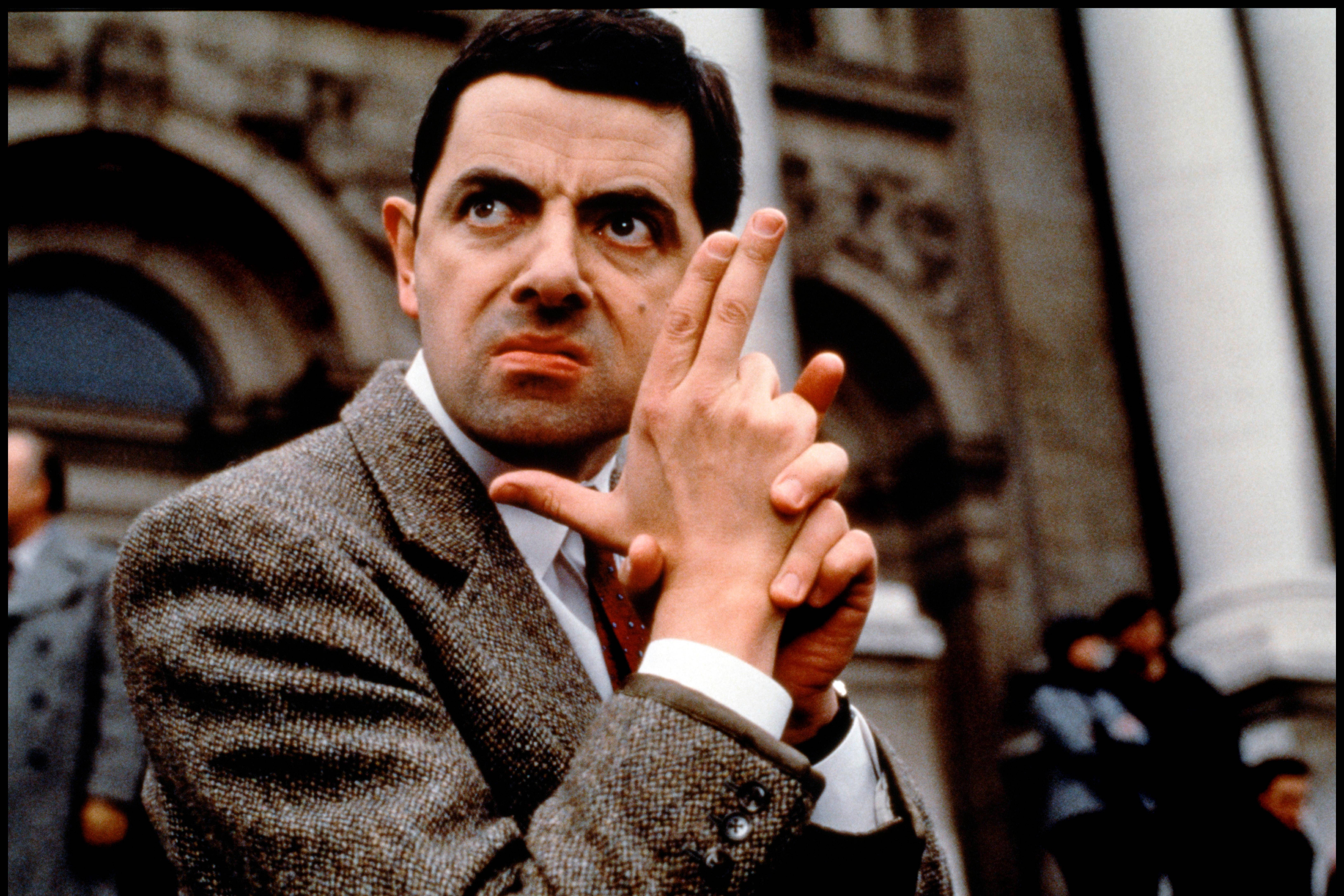 Mr Bean 4k Finger Guns Wallpaper