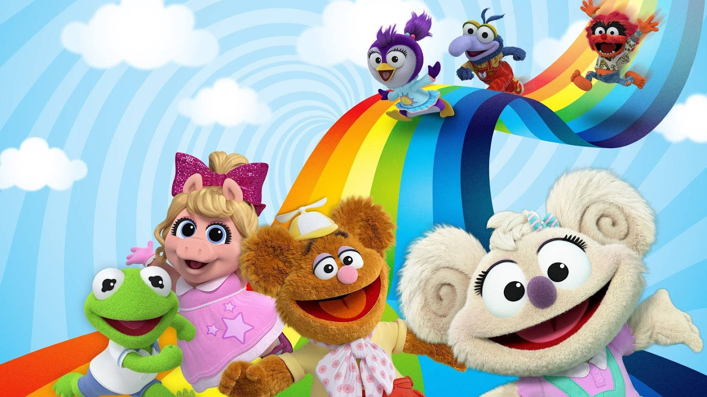 Muppet Babies Enjoying Rainbow Slide Adventure Wallpaper
