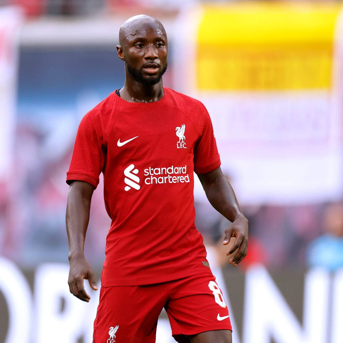 Naby Keita In Action: Dressed In Bright Reds Wallpaper