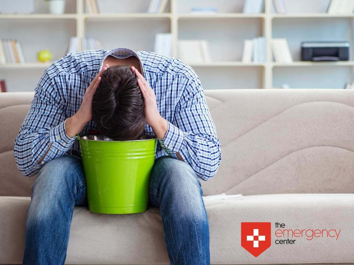 Nauseous Man With Green Bucket Wallpaper