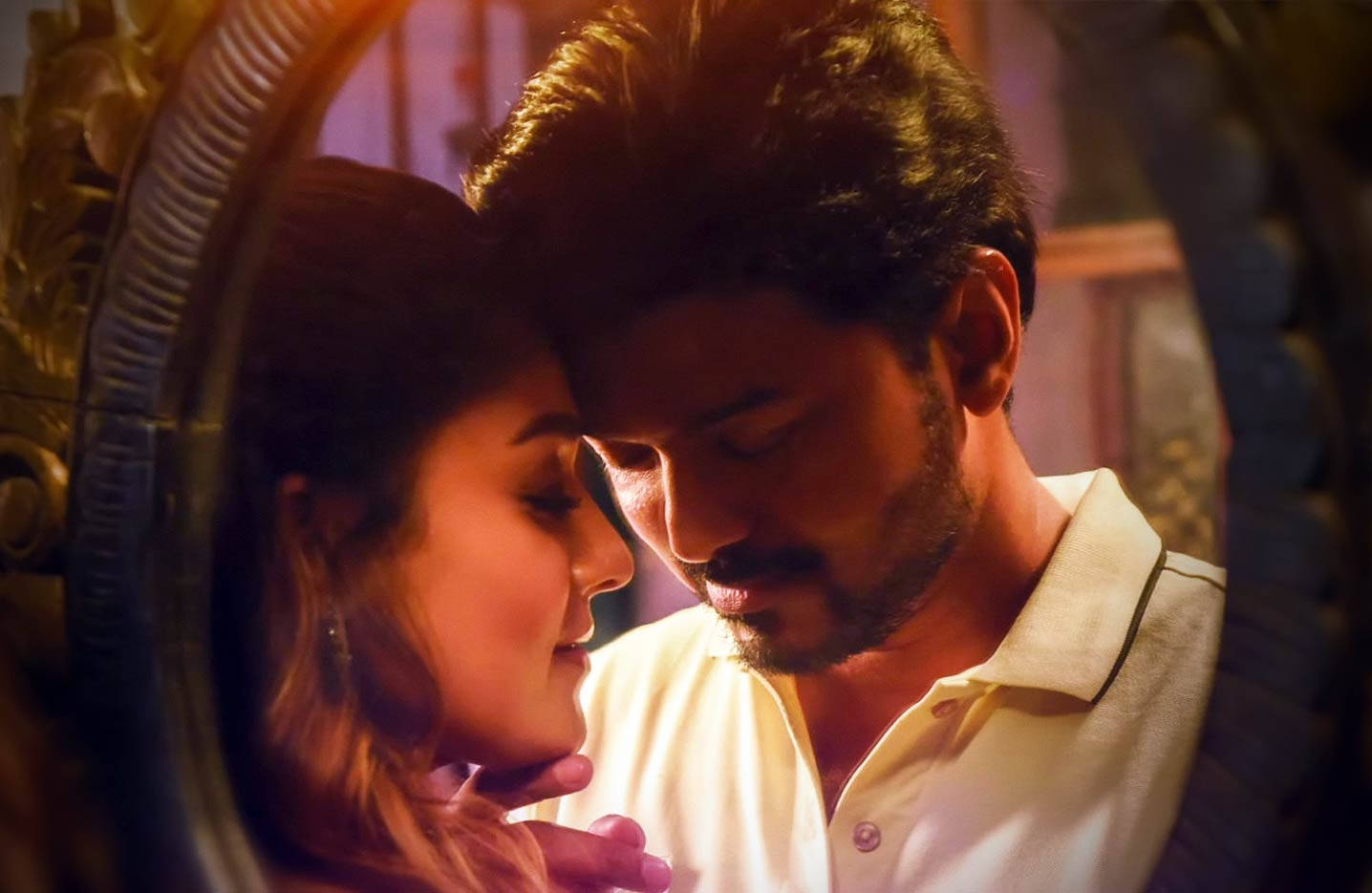 Nayanthara And Vijay Sharing An Intimate Moment On A Mirror Reflection Wallpaper