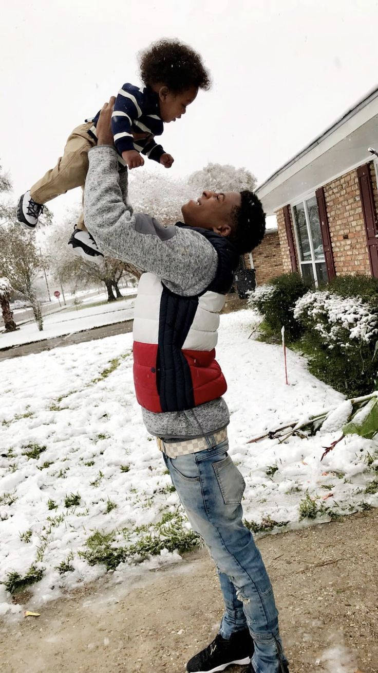 Nba Youngboy Enjoys Quality Time With His Family Wallpaper