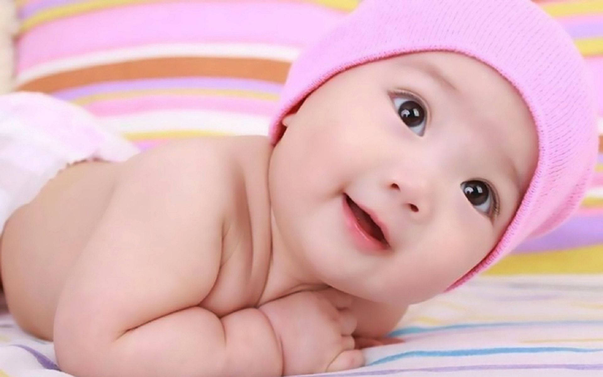 Newborn Baby Pink Bonnet Wallpaper