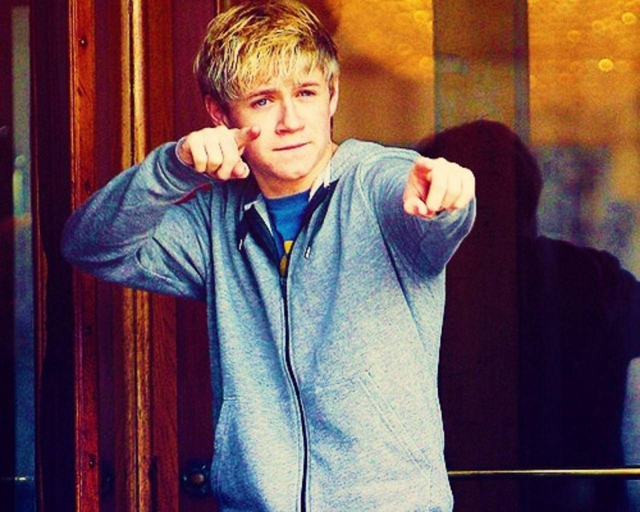 Niall Horan Jacket Pointing Wallpaper