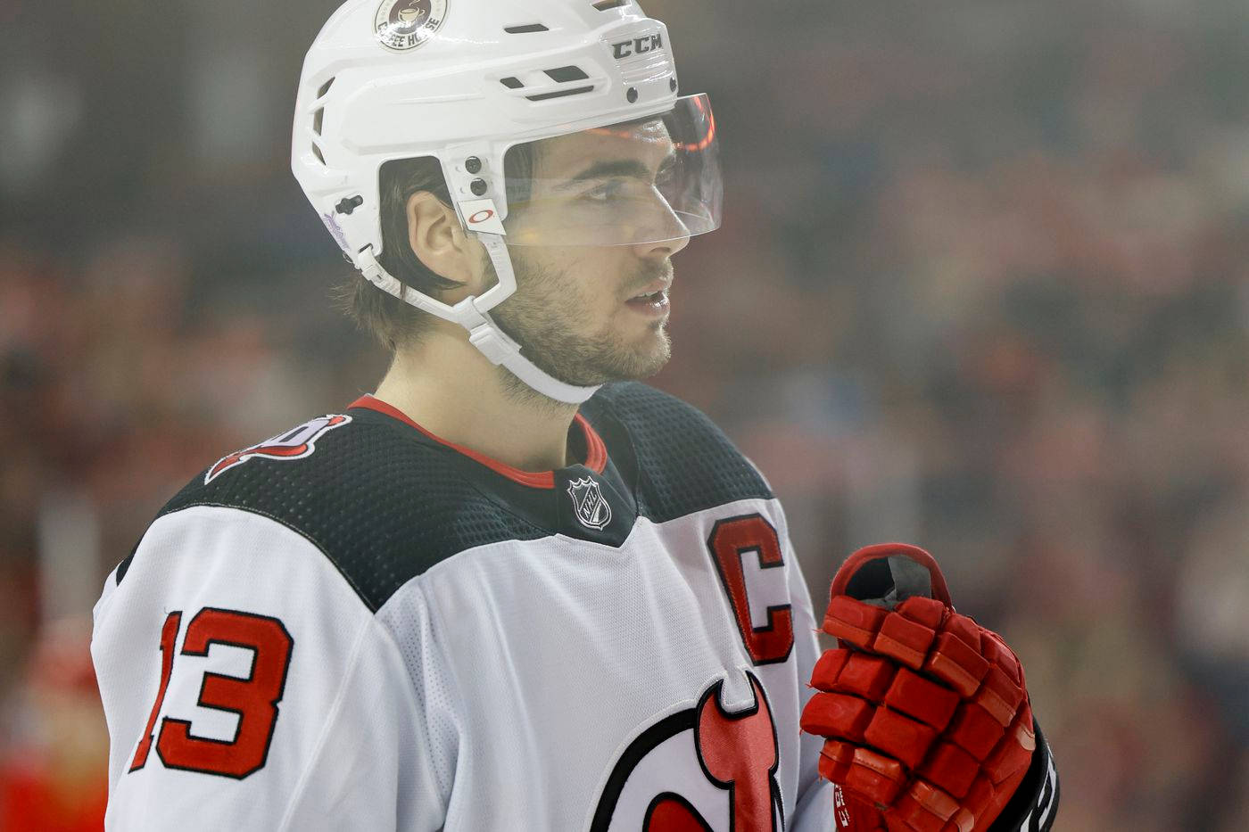 Nico Hischier Displaying Intensity On Ice Wallpaper