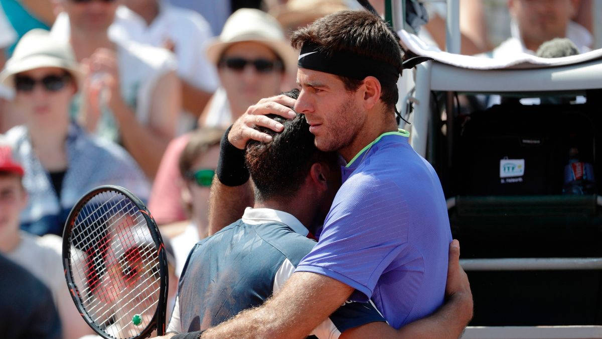 Nicolas Almagro Being Consoled Wallpaper