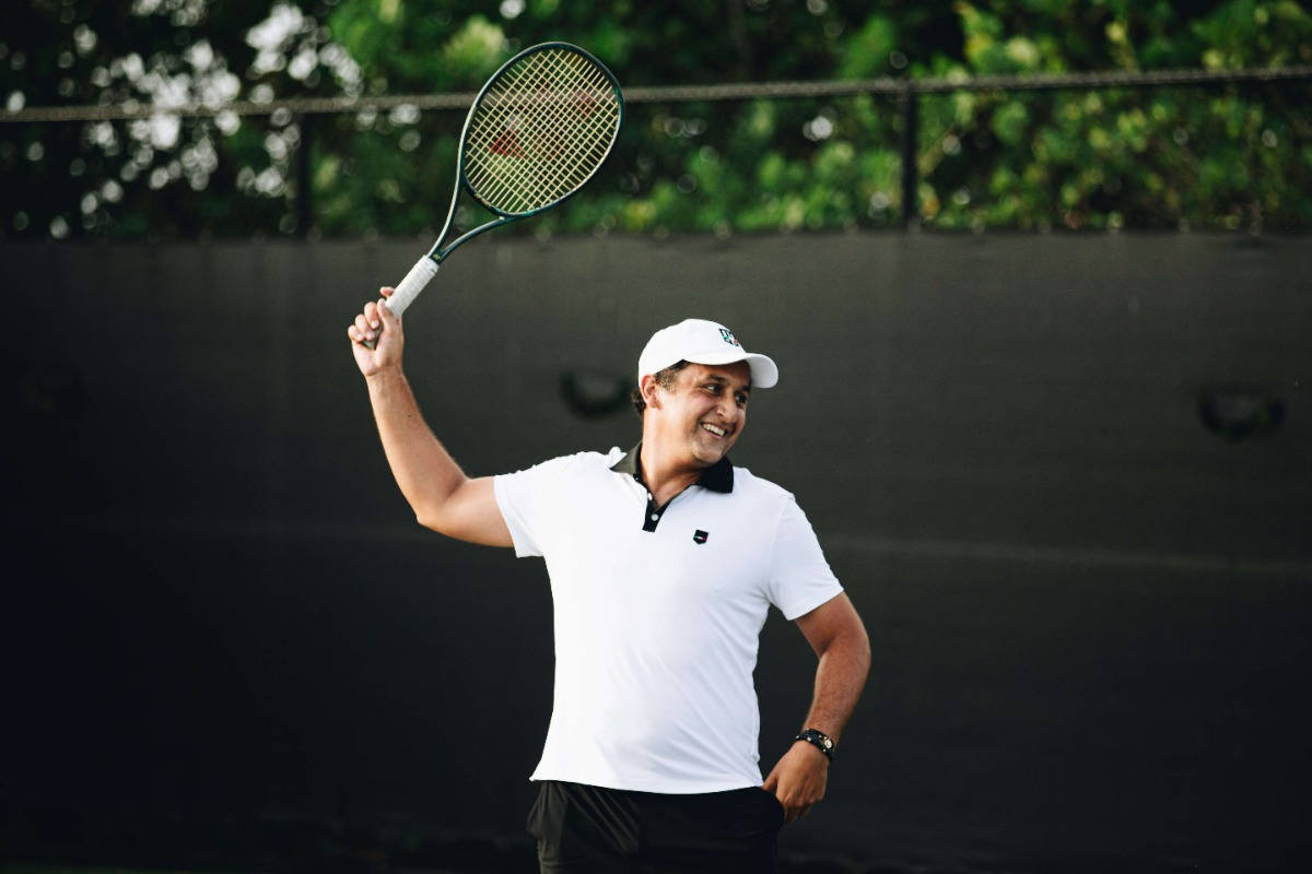 Nicolas Almagro Posing With Racket Wallpaper