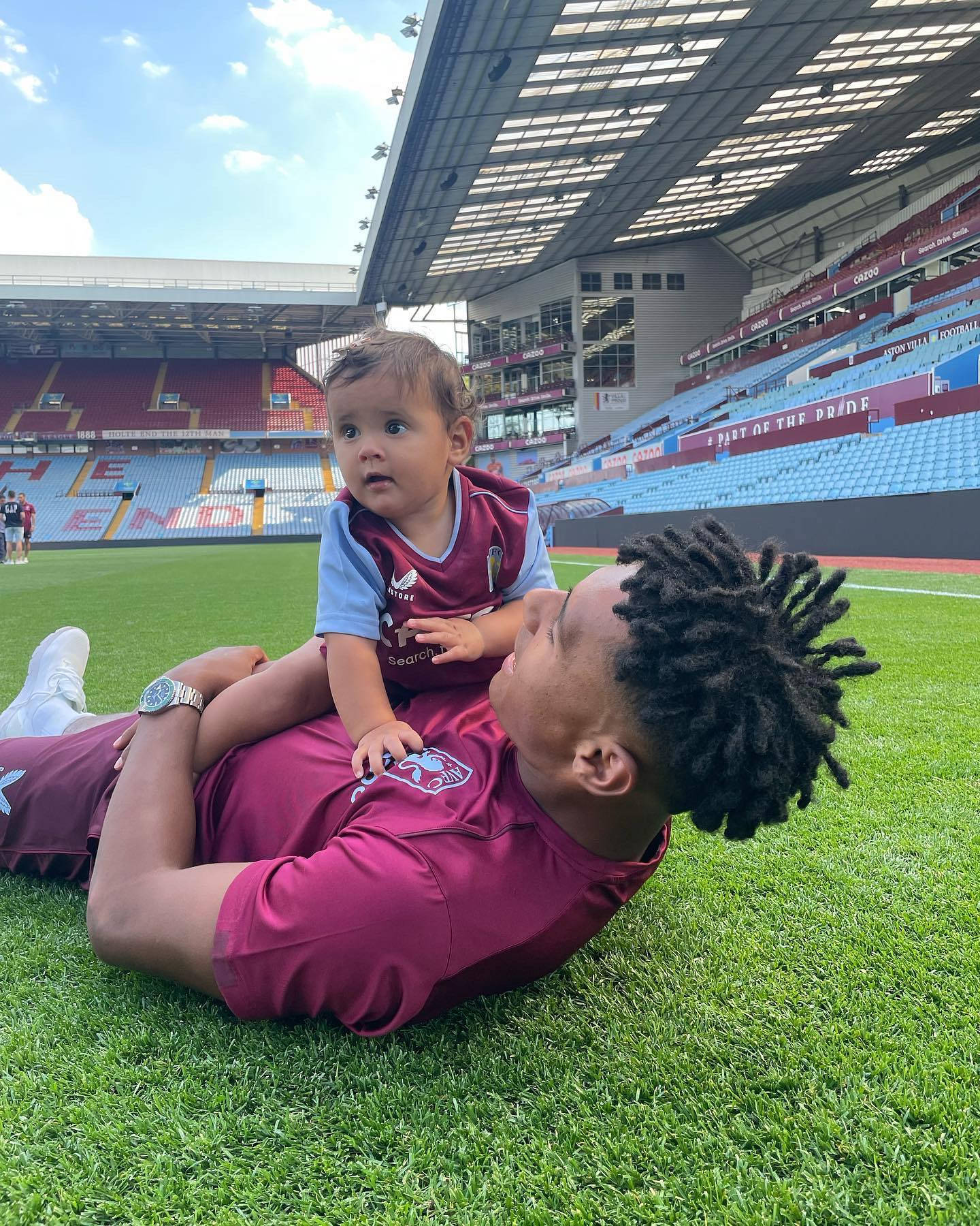 Ollie Watkins Playing With Toddler Wallpaper