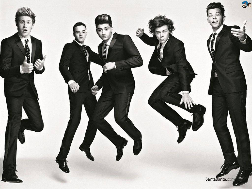 One Direction Performing In All Black Suits Wallpaper