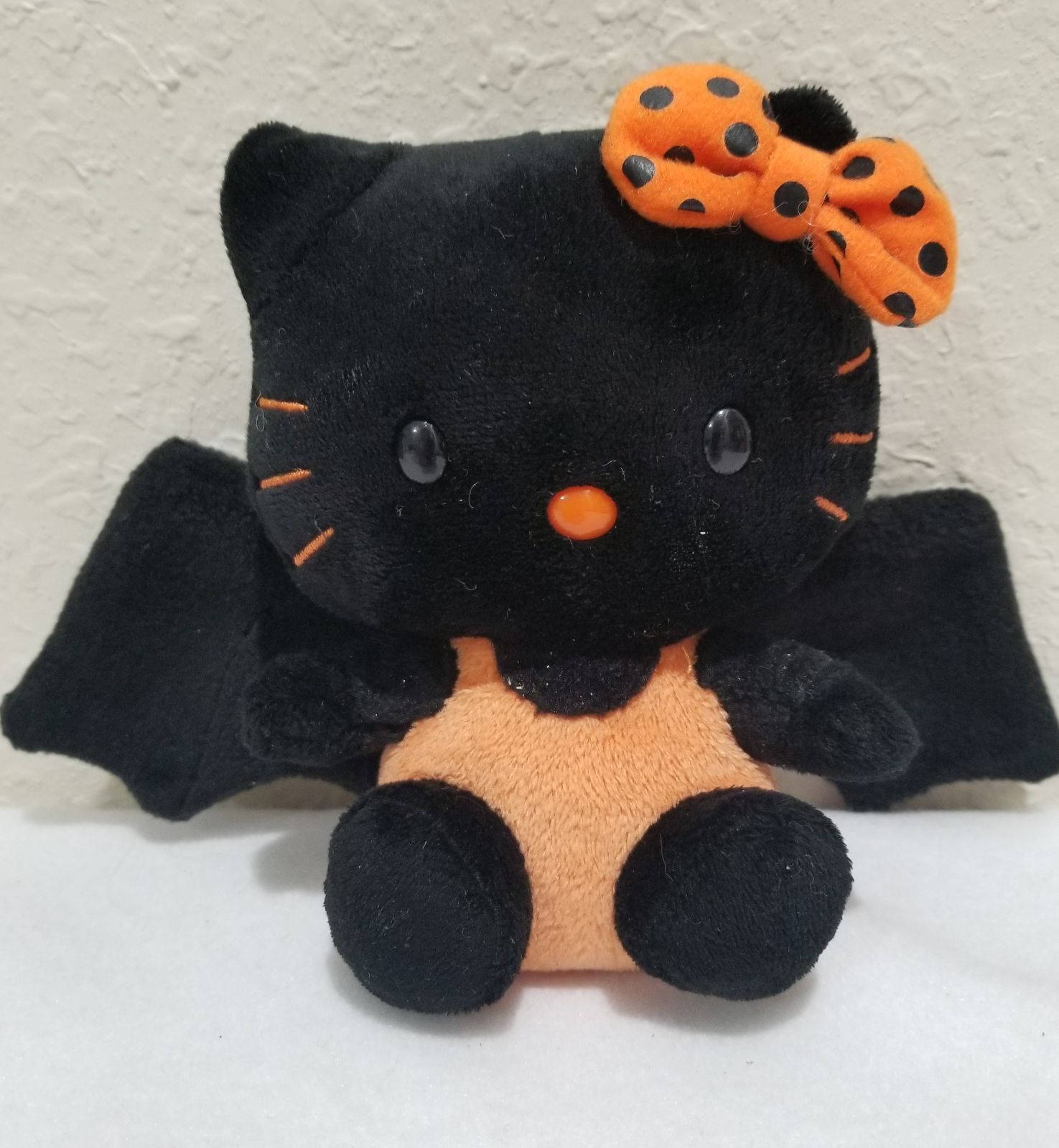 Orange-black Bat Hello Kitty Halloween Wallpaper