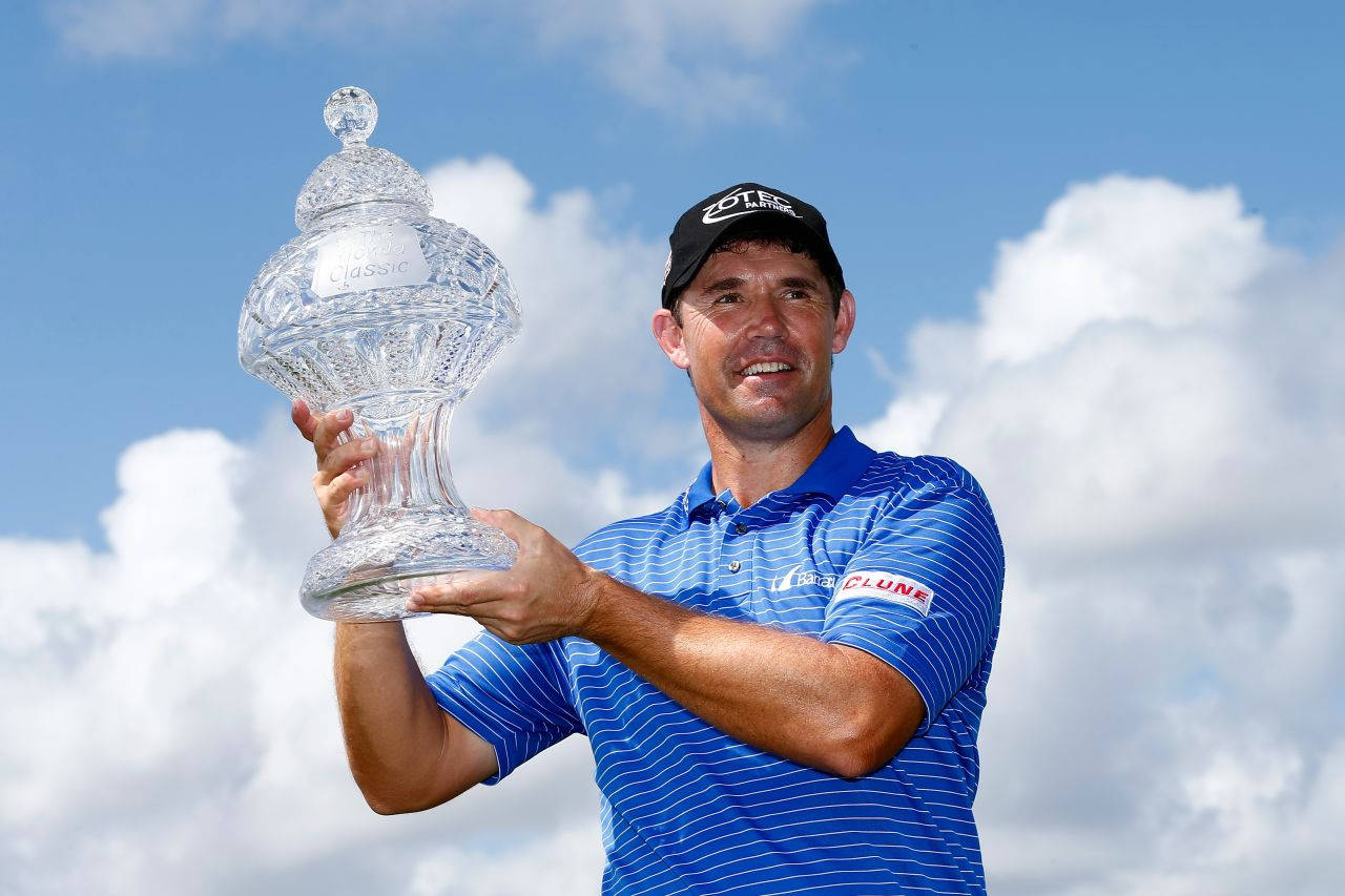 Padraig Harrington Trophy On Clouds Wallpaper