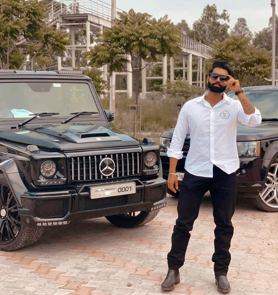 Parmish Verma With Black Cars Wallpaper