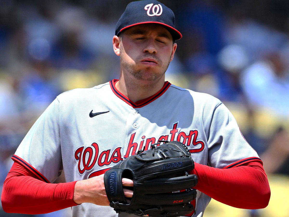 Patrick Corbin Putting On Glove Wallpaper