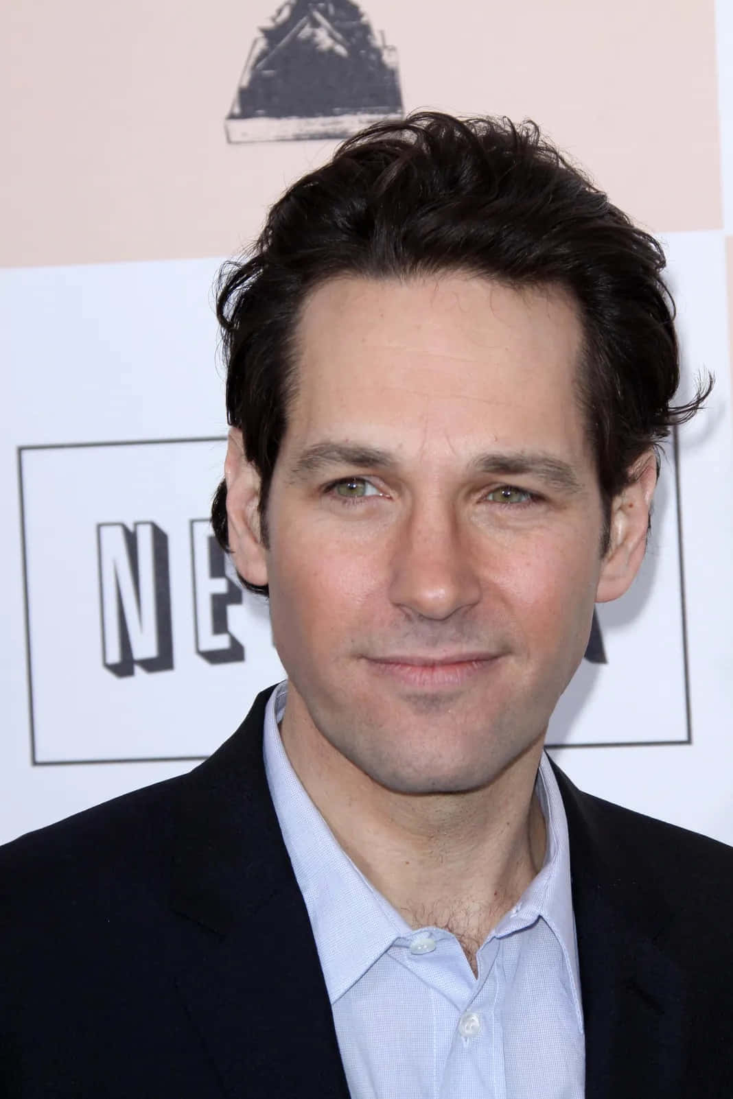 Paul Rudd Effortlessly Charming The Camera Wallpaper