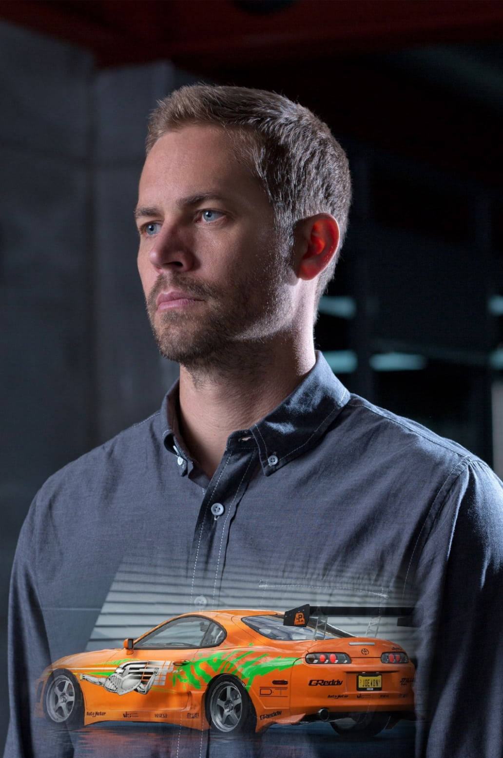 Paul Walker And Orange Race Car Wallpaper