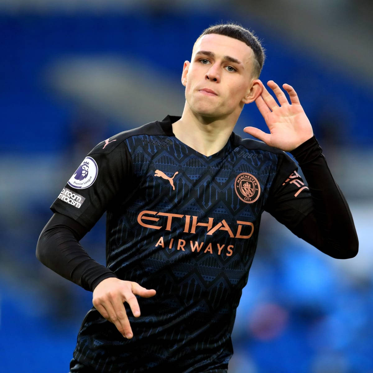 Phil Foden In Black Jersey Wallpaper